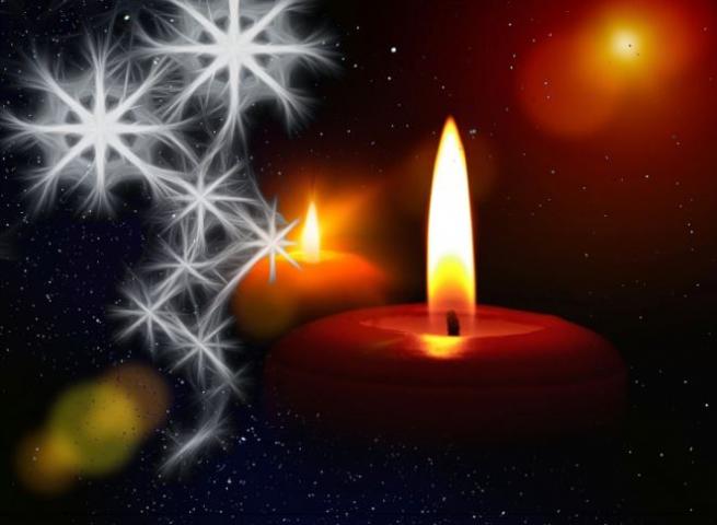 Kynttilä ja lumihiutale